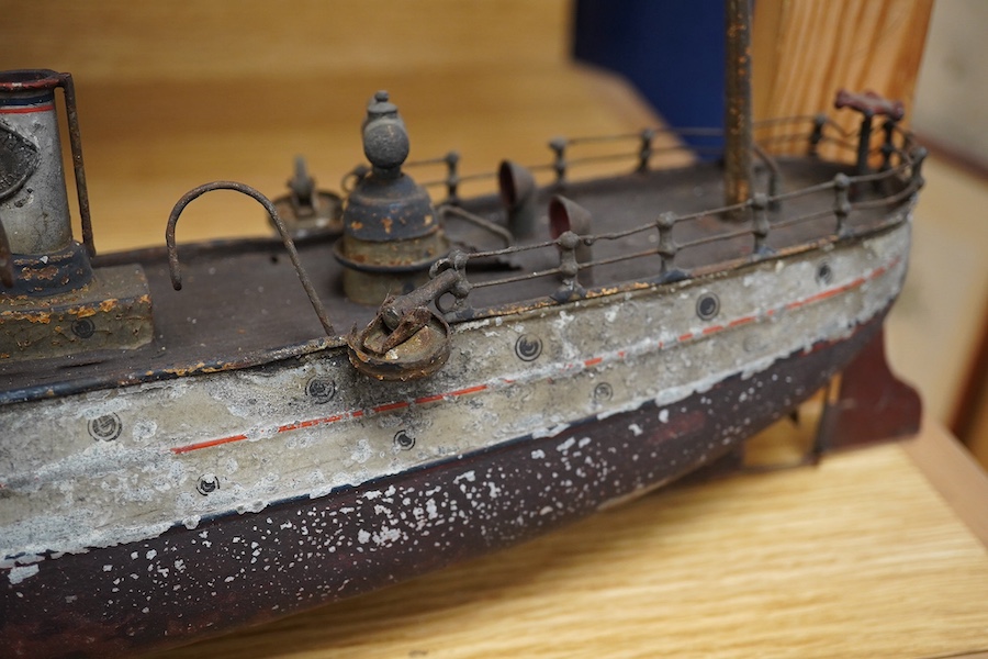 An Ernst Plank for Gamages Ltd clockwork tinplate gun-boat, 40cm in length. Condition - poor.